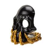 BLACK AND GOLD SKULL CANDLEHOLDER C/24