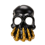 BLACK AND GOLD SKULL CANDLEHOLDER C/24