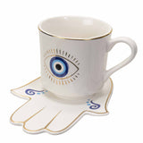 EVIL EYE CUP AND SAUCER WHITE C/36